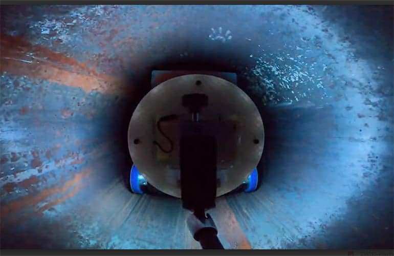 CMU pipe-repair robots crawl into natural gas pipelines and coat them.