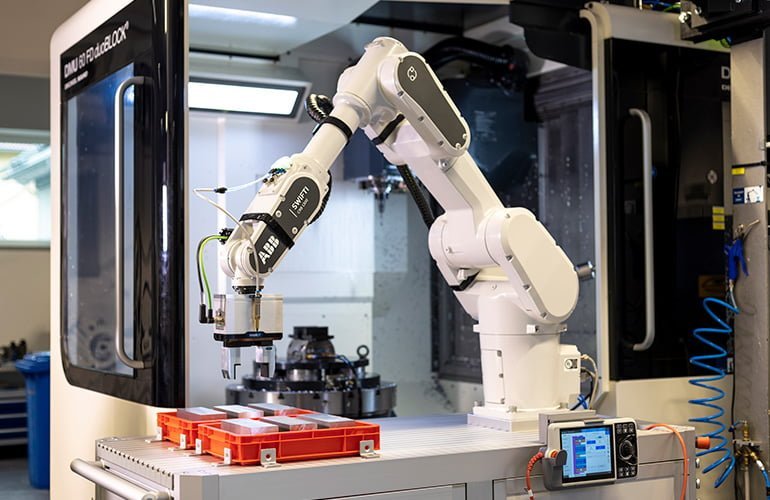 ABB’s SWIFTI CRB 1300 performing a machine tending task.