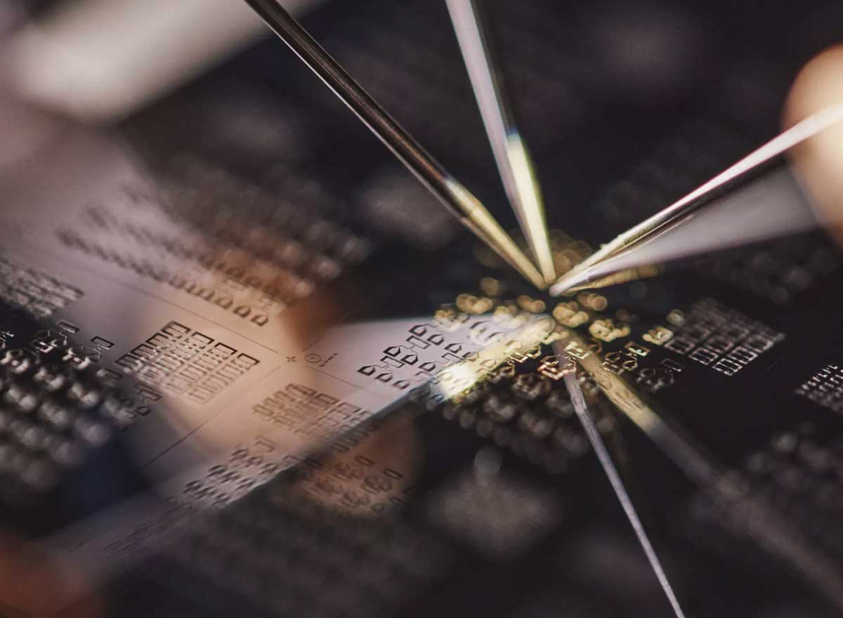 Alice and Bob wafer being probed for resistance