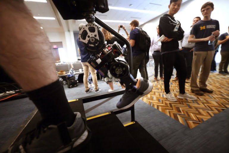 University of Michigan students demo a robotic prosthetic designed by Robert Gregg’s Locomotor Control Systems Laboratory.
