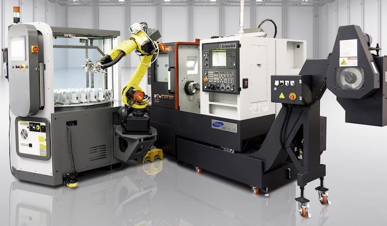 an automated gripper changer is part of the CubeBOX machine tending workcell shown here.